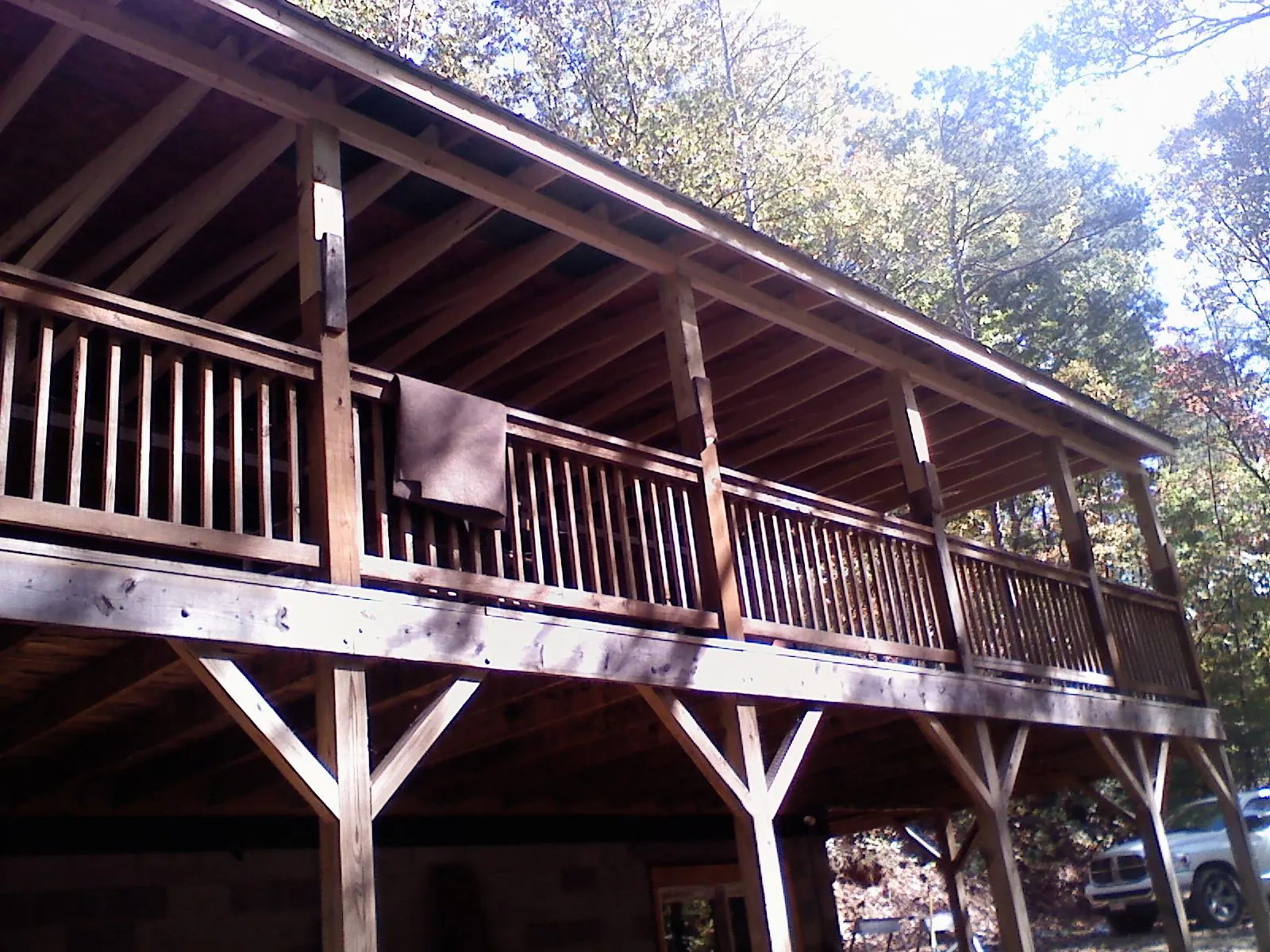 Timber framing under a new elevated porch and deck — Roof Leak Repair in Caledonia by Roofing Brothers